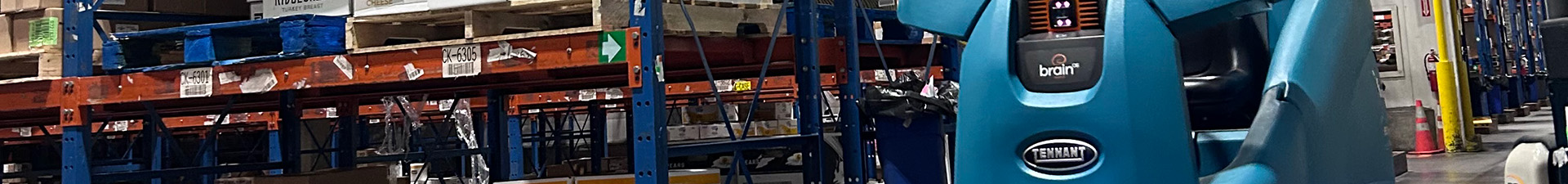 T16AMR Industrial Robotic Floor Scrubber cleaning in a warehouse