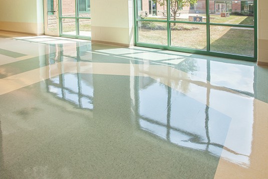 Tennant BR-2000-DC polishes and controls dust
