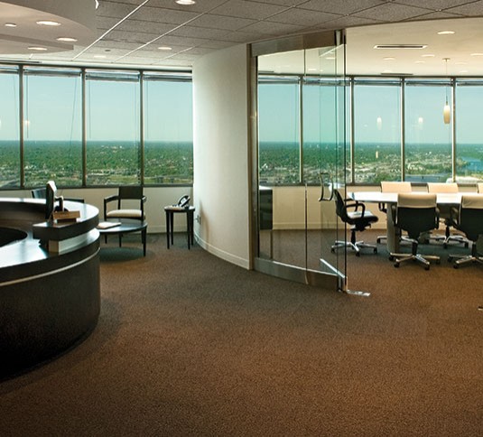 Office with carpeted flooring